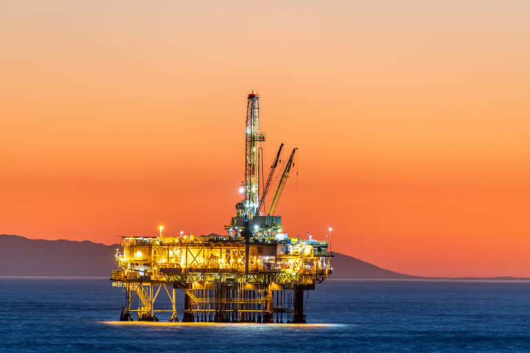 Offshore oil platform at dusk